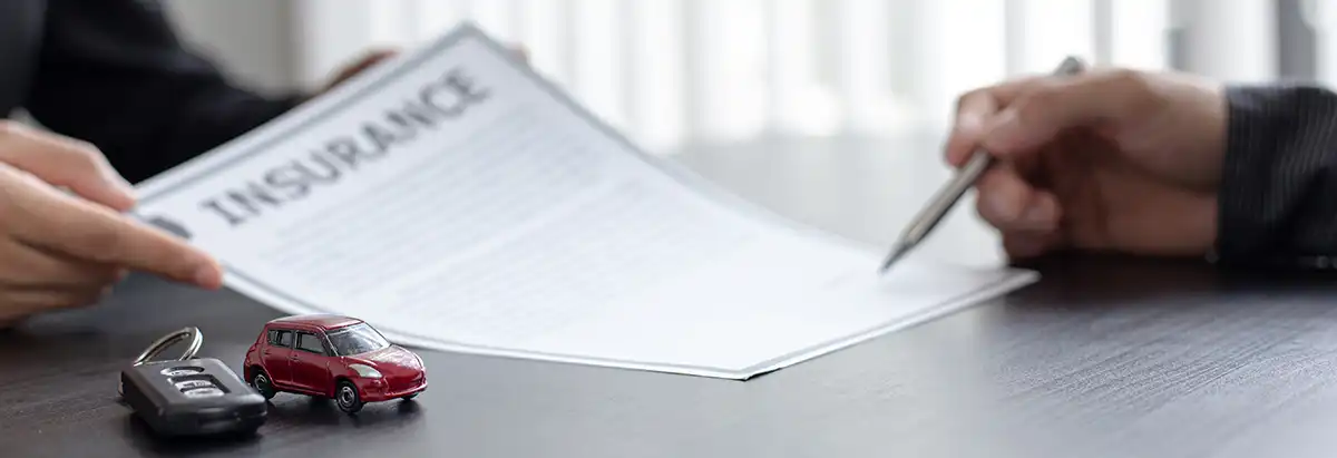 Car insurance agreement and keys